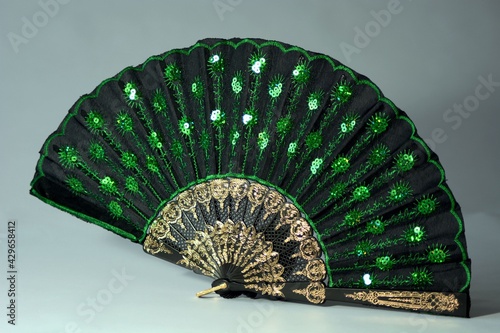Black and green fan.