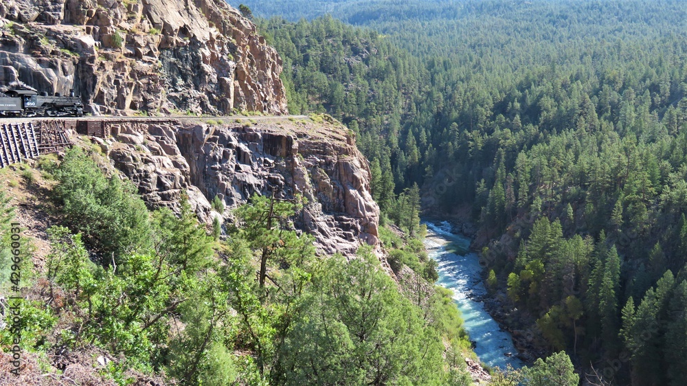 Fototapeta premium Riding the Rails of Animas Canyon Durango to Silverton Narrow Guage Railroad