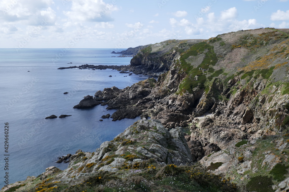 Rocky headland on coast of Guernsey