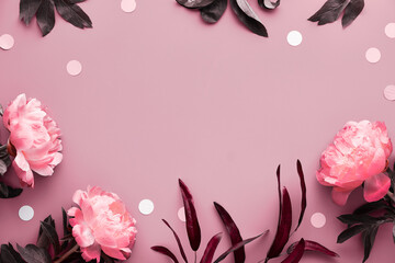 Pink peony monochrome greeting card. Fresh fragrant peony flowers, leaves and paper circles, confetti. Mother's day, birthday, romantic greeting card. Top view, flat lay design with copy-space.
