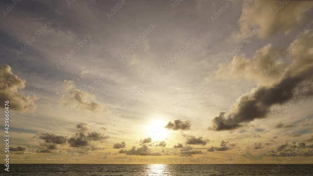 Nature video Time lapse video. Scene of Colorful amazing sunset Golden sky to Red sky Day to Night with Moving clouds background in nature and travel concept.