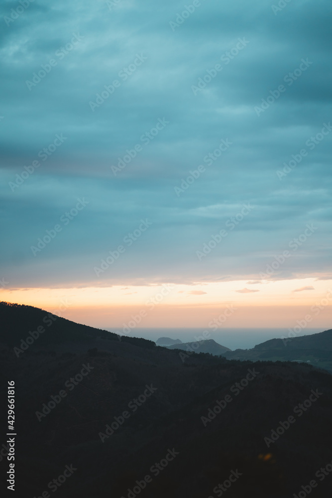 Sunset over the Basque Country coast on a cloudy day Sunset over the Basque Country coast on a cloudy day