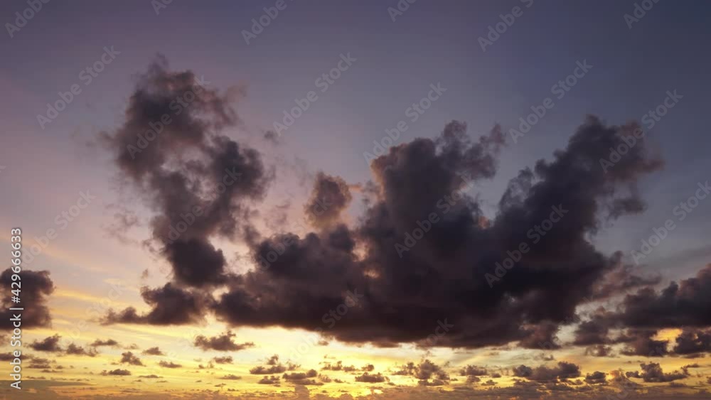 Nature video Time lapse video. Scene of Colorful amazing sunset Golden sky to Red sky night to day with Moving clouds background in nature and travel concept. Nature video Time lapse video. Scene of Colorful amazing sunset Golden sky to Red sky night to day with Moving clouds background in nature and travel concept.