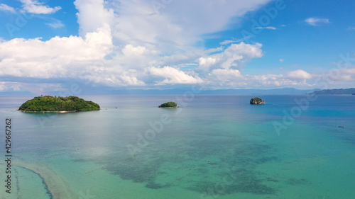 Fototapeta Naklejka Na Ścianę i Meble -  Seascape with tropical islands and coral reefs, aerial view. Caramoan Islands, Philippines. Summer and travel vacation concept.