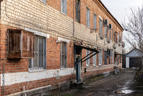 The village of Khanskaya. Russia. Winter 2020. Courtyard of an old apartment building. House on Krasnooktyabrskaya street.