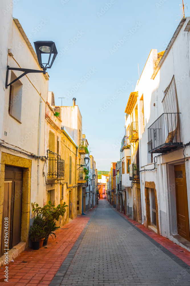 Càlig, Baix Maestrat, Valencian Community, Spain. Beautiful historic street. Traditional and typical spanish village. Part of the Taula del Sénia free association of municipalities.