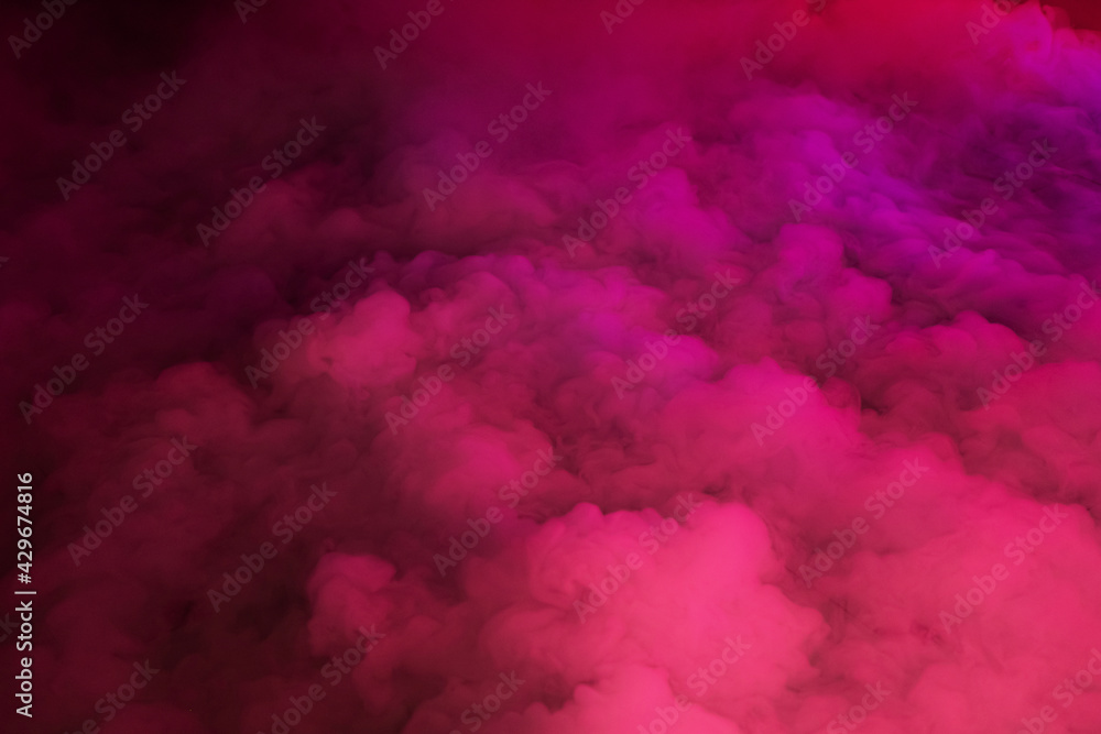Thick, bright pink smoke. The crimson smoke from the bomb explosions looks like a background of clouds.