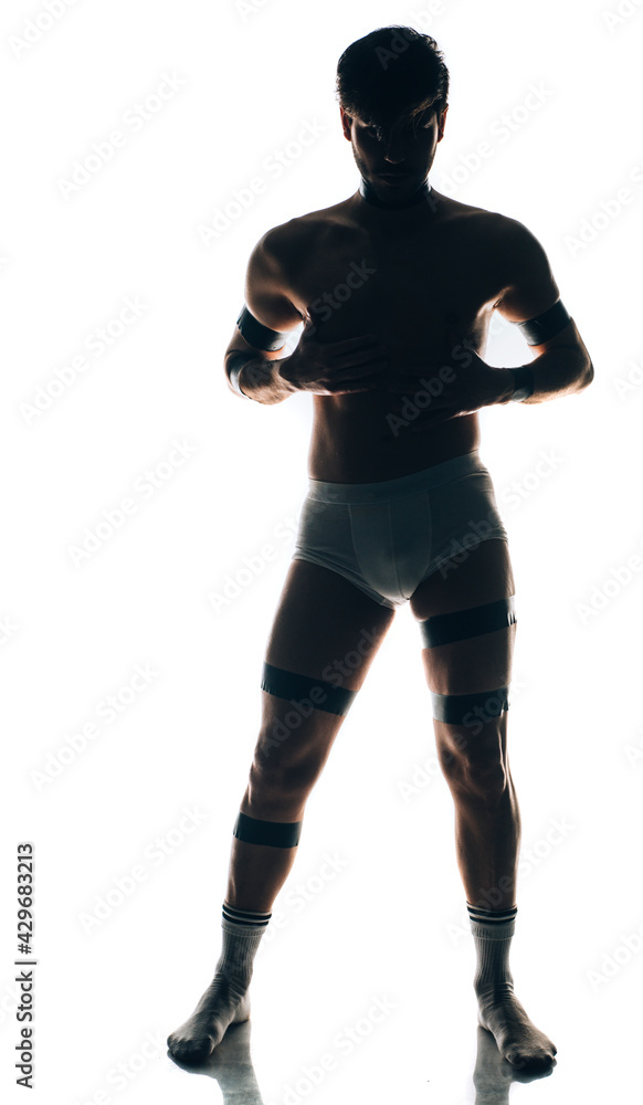 Sexual muscular silhouette man posing over white background Sexual muscular silhouette man posing over white background