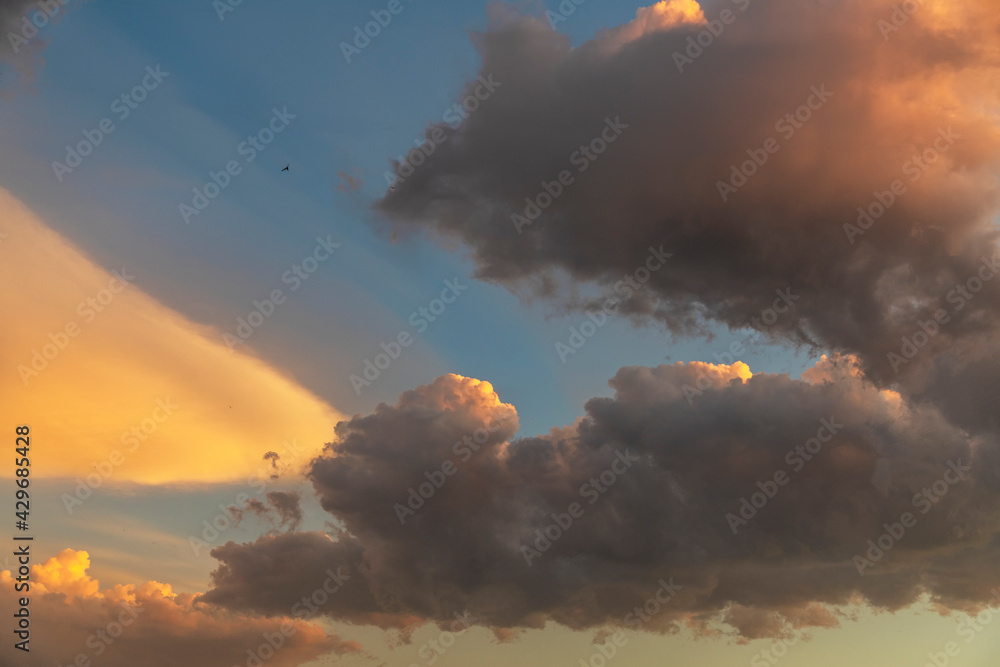 Colorful sky with beautiful clouds after sunset. Sky background.