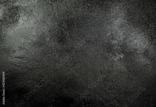 Fotobehang Black textured wet asphalt background.