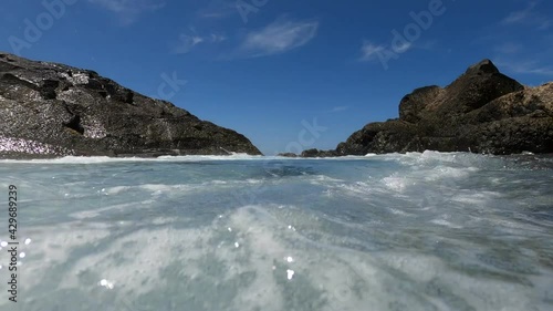 wave splashing on the clear sea.