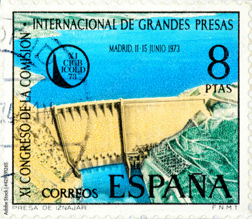 stamp printed in the Spain shows Iznajar Dam on Genil River photo