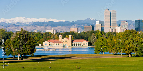City Park Denver Panorama on a summer day with snow capped Mount Evans in the background and geese in the foreground