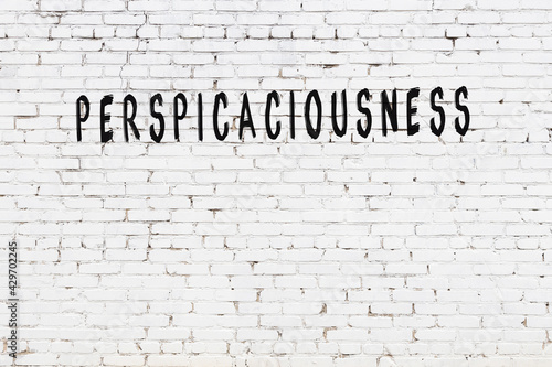 Fotografía College chalk desk with the word perspicaciousness written on in