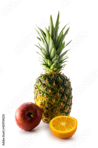 Fresh pineapple  apple and orange isolated on white