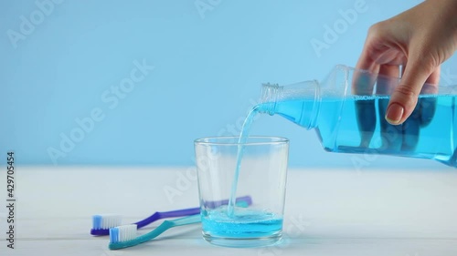mouthwash on the table in a glass. Oral care