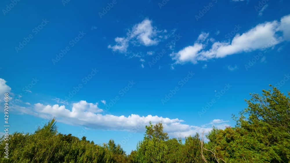 Beautiful time lapse of the Tuscan countryside with rolling clouds and Mediterranean scrub Beautiful time lapse of the Tuscan countryside with rolling clouds and Mediterranean scrub