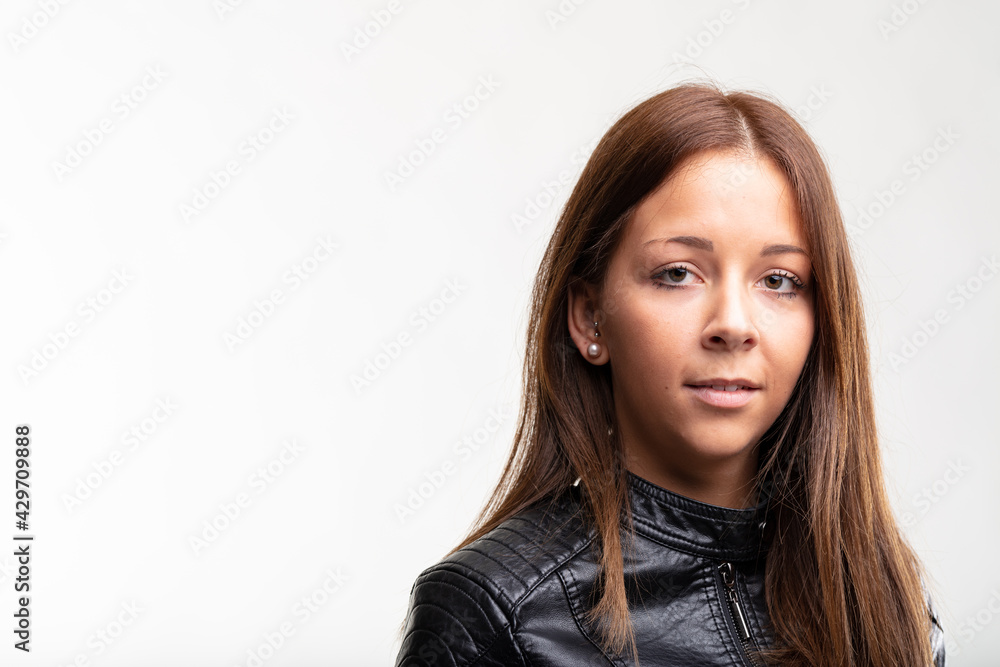 Serious thoughtful young woman looking quietly at the camera Serious thoughtful young woman looking quietly at the camera