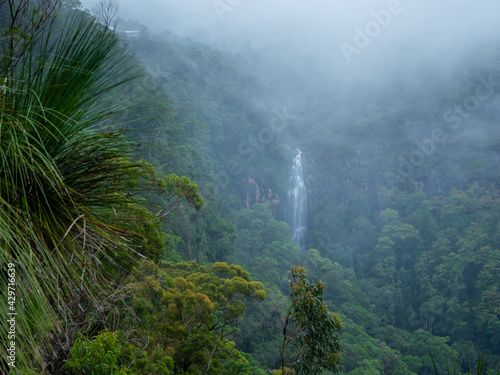 Waterfall and Misty Mountains