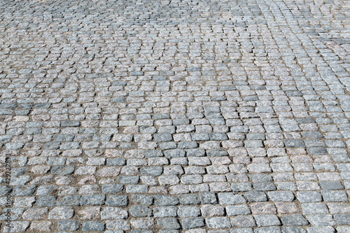 Ancient sidewalk lined with small natural stones
