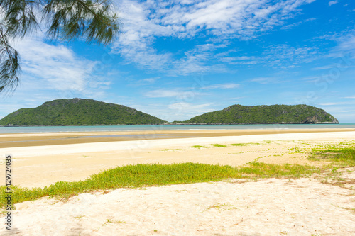 White Sandy Beach of Laem Sala beach which is Flanked On Three Sides By Dry Limestone Hills, Thailand.