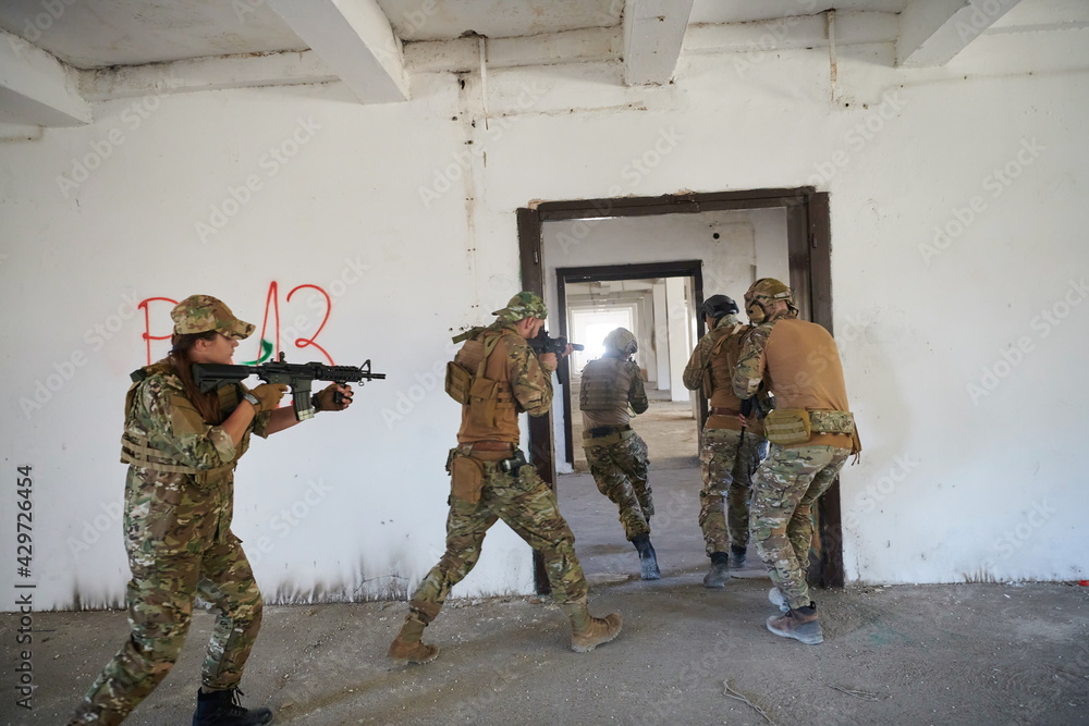 Fototapeta premium military troops in action urban environment