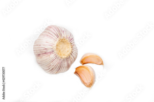 Raw garlic isolated on white background.
