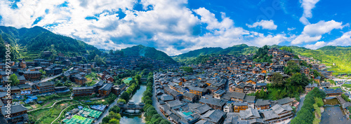 Dusk scenery of Qianhu Miao village in Xijiang, Qiandongnan, Guizhou Province, China photo