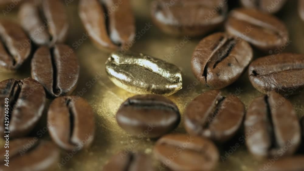 Gold grain. Roasted vietnamese coffee bean. Fragrant coffee beans scrolls slowly around the camera. Slow Motion Close Up of Whole Roasted Coffee Beans.High angle view. 4k Gold grain. Roasted vietnamese coffee bean. Fragrant coffee beans scrolls slowly around the camera. Slow Motion Close Up of Whole Roasted Coffee Beans.High angle view. 4k