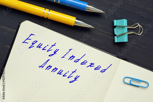 Conceptual photo about Equity Indexed Annuity with handwritten phrase.
