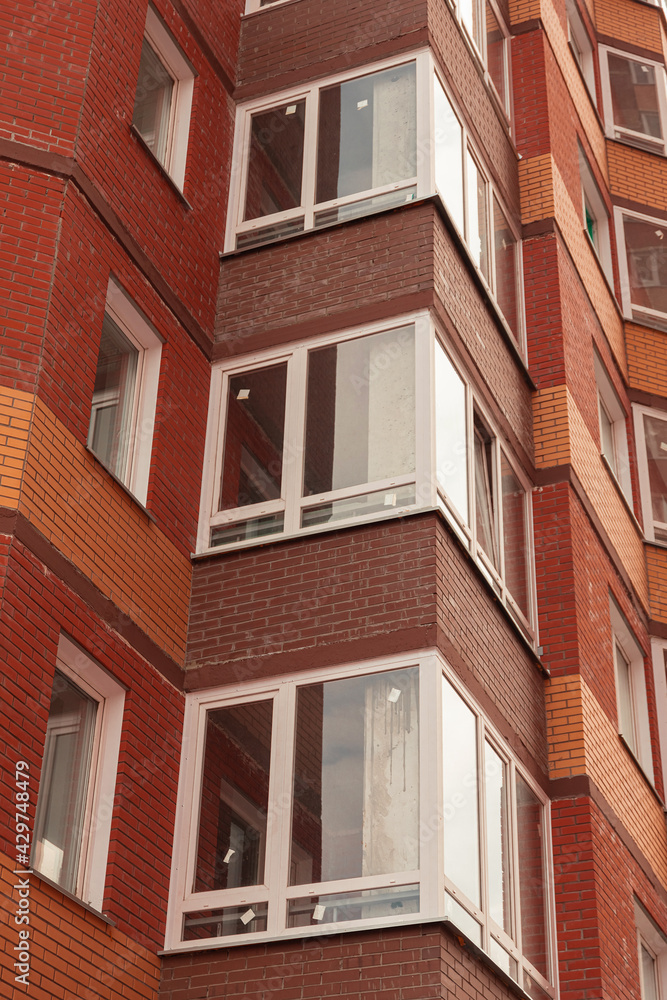 brick building made of orange brick close up