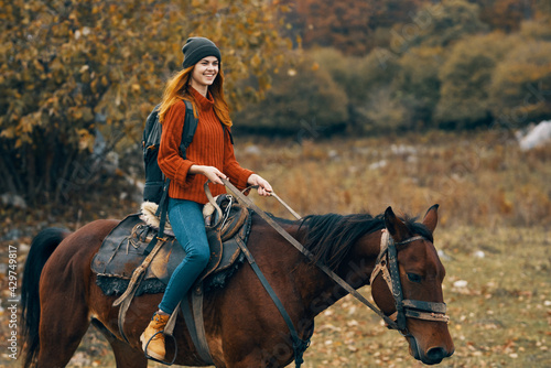 woman hiker riding horse mountains landscape travel adventure © SHOTPRIME STUDIO