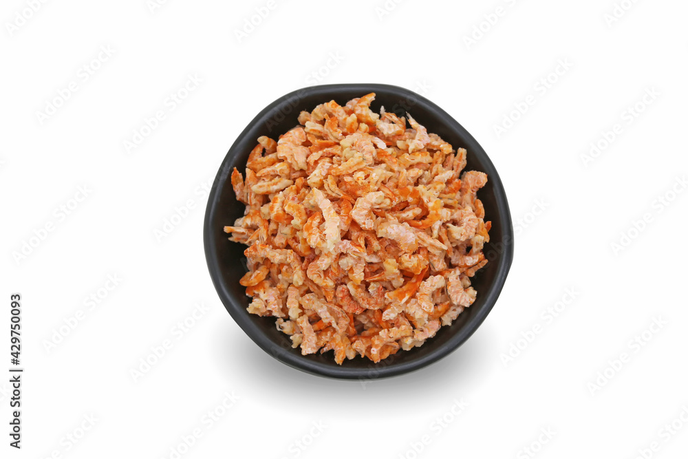 Small dried shrimp on a black cup with isolated white background. Small dried shrimp on a black cup with isolated white background.