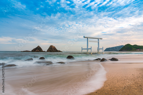 Sakurai Futamigaura's sacred Couple Stones and torii gate view from de beach in Itoshima, Fukuoka, Japan scenic landscape