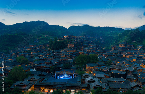 Night view of Qianhu Miao village in Xijiang, Qiandongnan, Guizhou Province, China © Weiming
