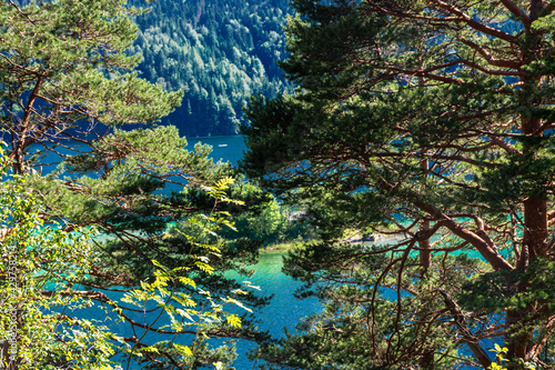 Wallpaper Mural Faboulus landscape of Eibsee Lake with turquoise water in front of Zugspitze summit under sunlight. Location: Eibsee lake, Garmisch-Partenkirchen Bavarian alps, Germany, Europe Torontodigital.ca