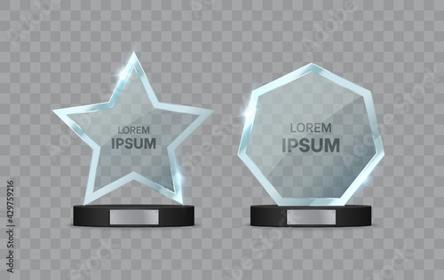 Glass trophy awards set. Transparent star and geometric shape on the pedestal. Vector illustration