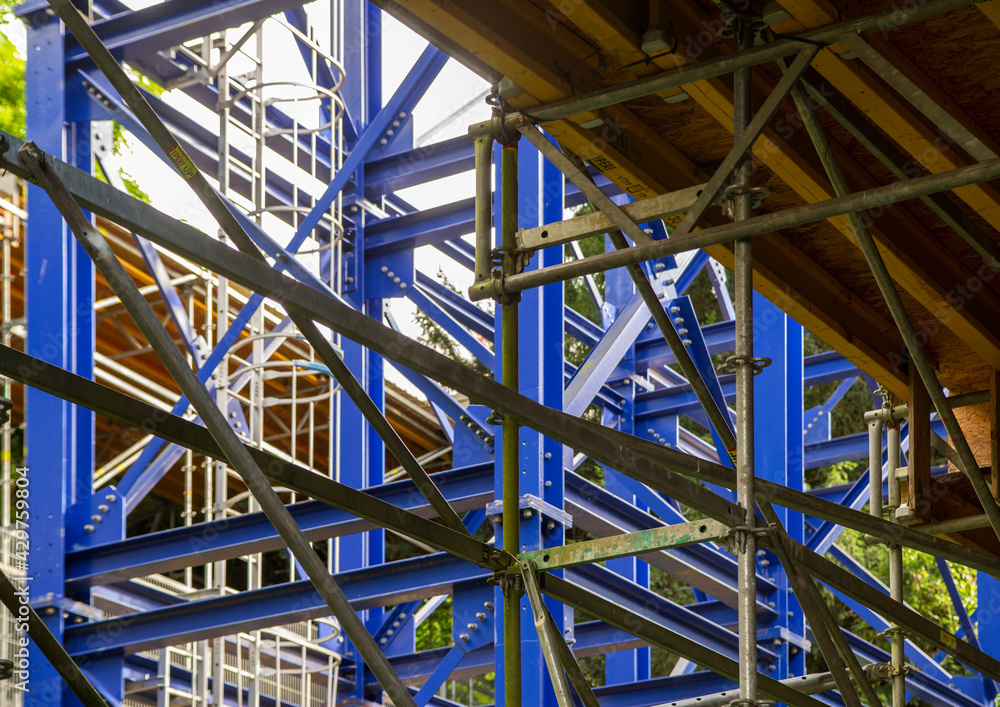 Blue painted Huge metallic structure of a temporary bridge
