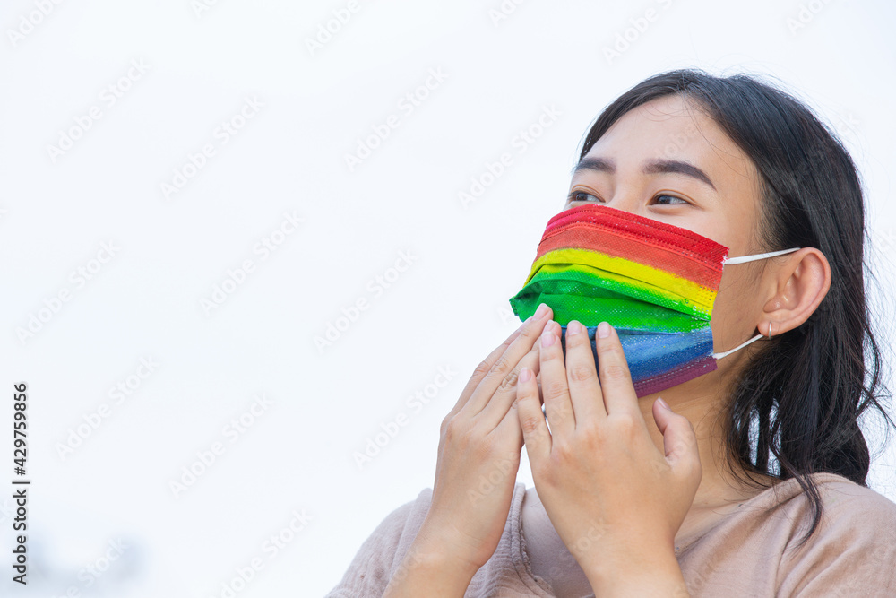 Rainbow face mask awareness for LGBT community pride concept Rainbow face mask awareness for LGBT community pride concept