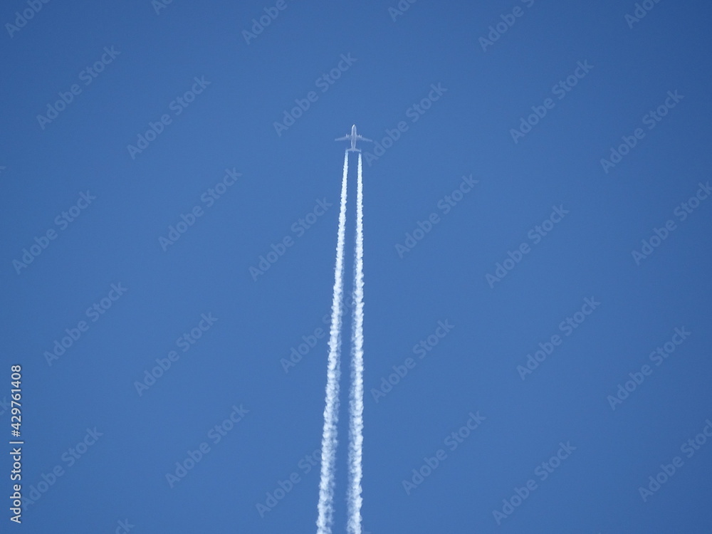 a plane in the blue sky a plane in the blue sky