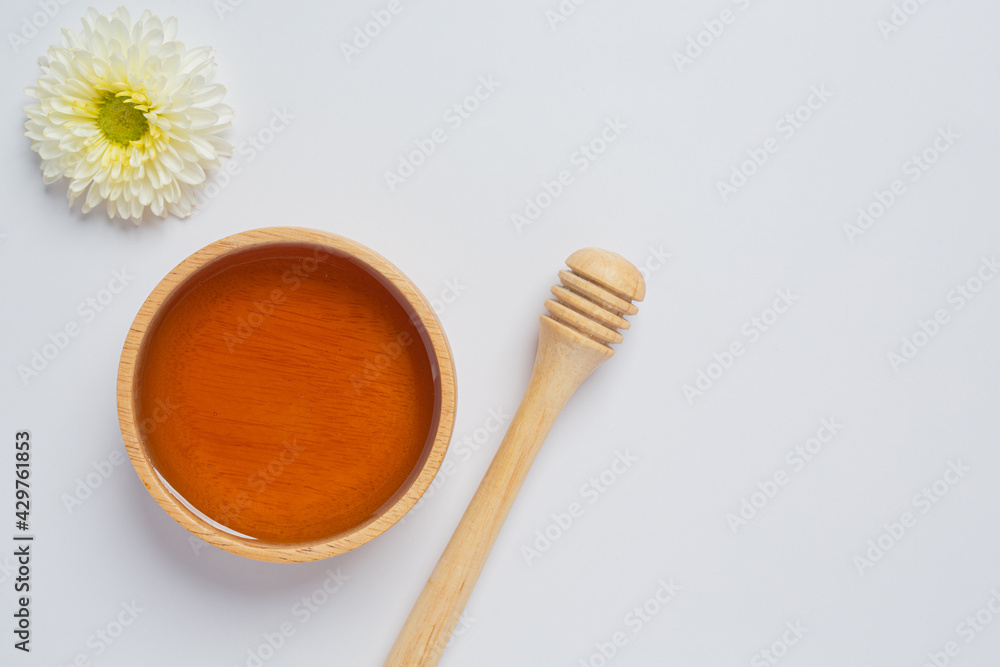 Delicious honey on white background Delicious honey on white background