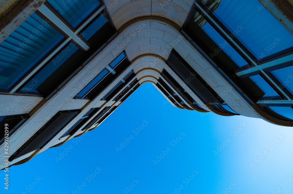 Fototapeta premium Low angle view of building against blue sky