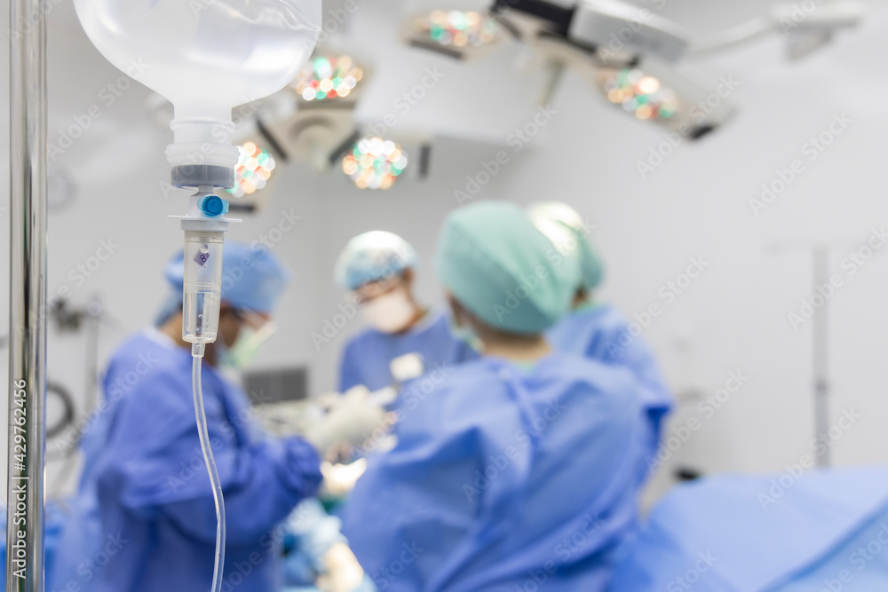 Set iv fluid intravenous drop saline drip in operating room,Medical Concept,treatment emergency and injection drug infusion care and chemotherapy.Selective focus.