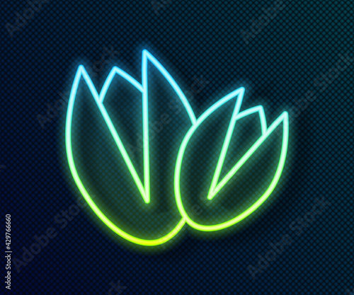 Glowing neon line Pistachio nuts icon isolated on black background. Vector