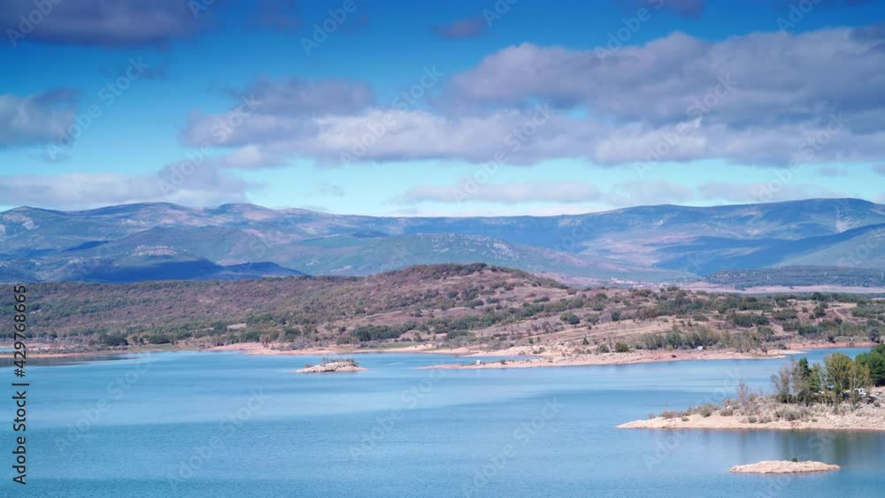 Time lapse of clouds moving over lake embalse de Aguilar de Campoo in province of Palencia, Castile and Leon community, northern Spain. Time lapse of clouds moving over lake embalse de Aguilar de Campoo in province of Palencia, Castile and Leon community, northern Spain.