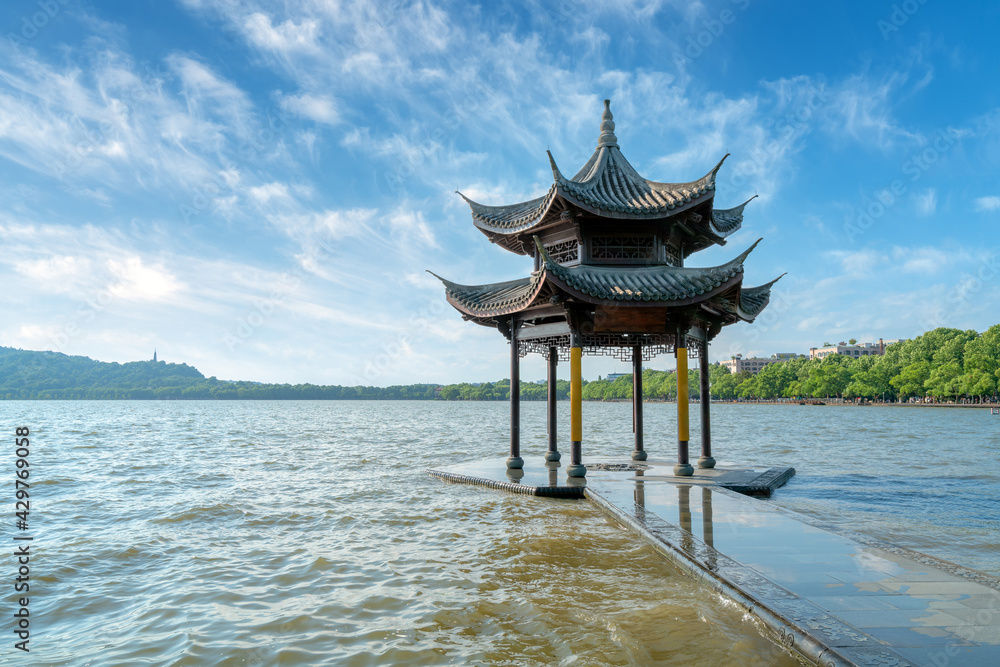 chinese ancient pavilion on the west lake in hangzhou.Translation:
