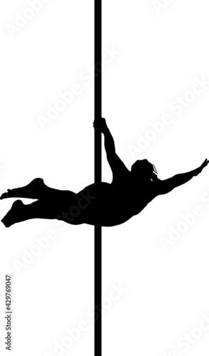 Silhouette of a woman performing a "Superman" on a pole