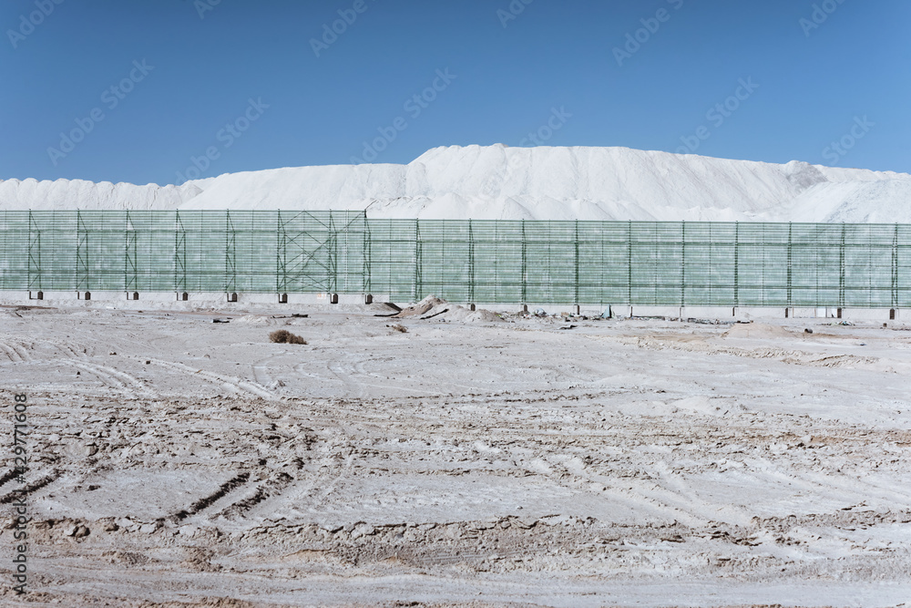 Open-air asbestos mining plant and steel frame fence
