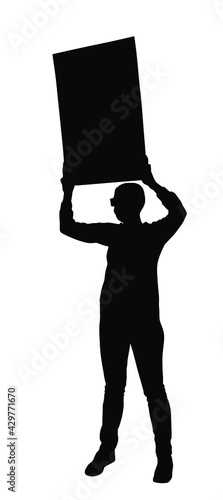 Demonstrator man protester hold banner in hands vector silhouette isolated. Hand holding protest placard sign on demonstration, revolution meeting. Boy laborer with poster on street event.