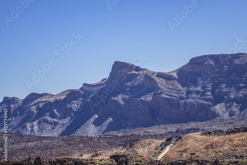 Dramatic moon-like scenery (Paisaje Lunar) at Las Canadas caldera in Teide National Park (Parque nacional del Teide). Tenerife, Canary Islands, Spain. photo